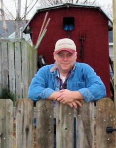 Steve the industrial copywriter leaning on the gate