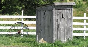 Outhouse on a farm representing cheap copywriting